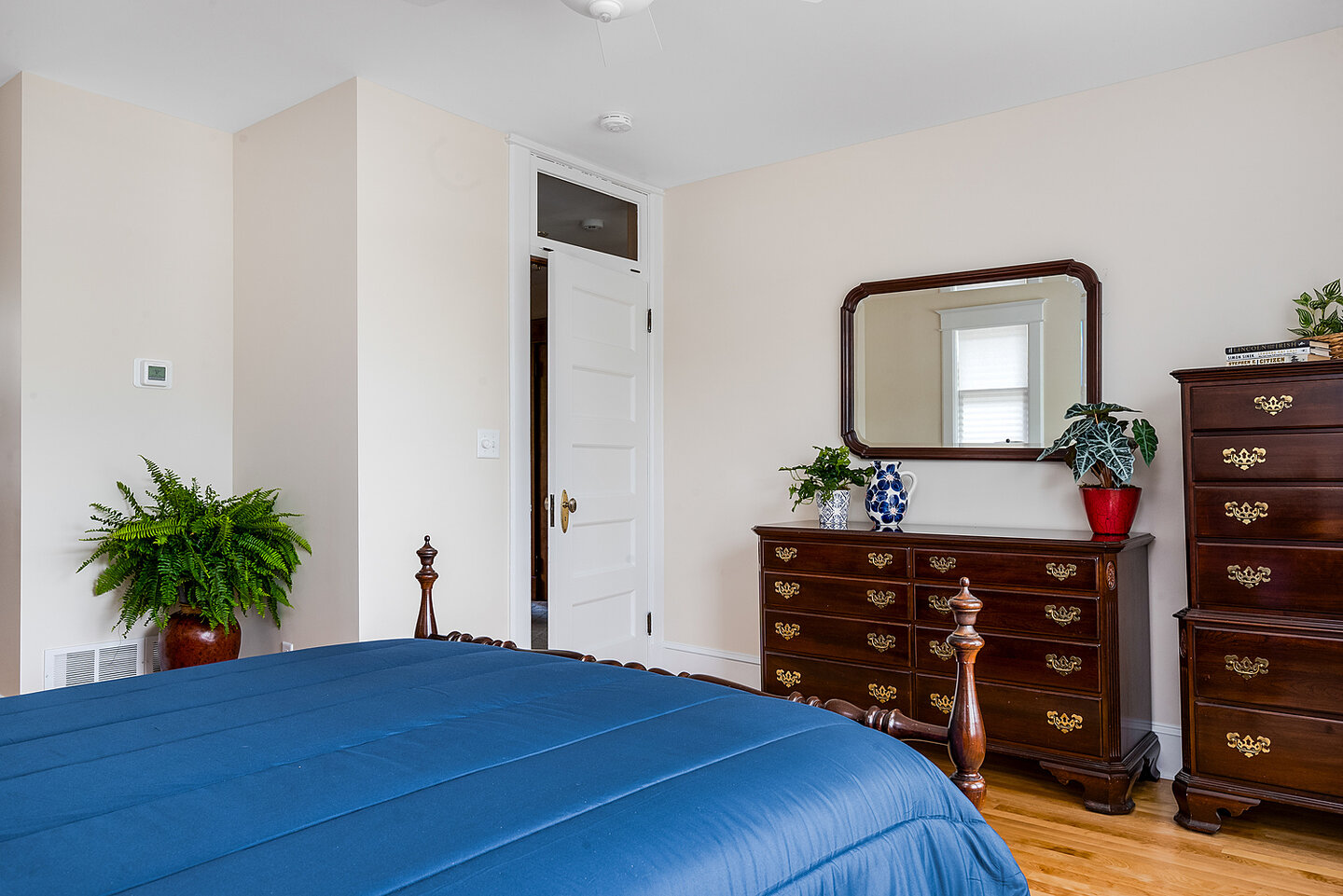 Original transom window above the bedroom door