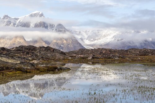Mountain lake landscape scenic view Greenland Secret Atlas