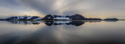 Mountain reflection sunset snow capped Secret Atlas