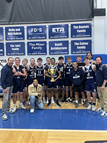Varsity Boys Basketball team after winning a trophy
Coach Andrew Garrett
Coach Brandon Curran