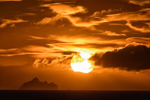 Giant sunset over the icebergs
