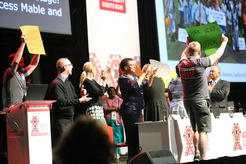 21st International AIDS Conference (AIDS 2016), Durban, South Africa.
Tuesday 19th July 2016, VENUE : Durban ICC Session Hall 1
Tuesday Plenary
Protesters on stage with dignitaries after Jonathan man invited them to come on stage
Photo©International AIDS Society/Abhi Indrarajan