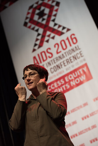 21st International AIDS Conference (AIDS 2016), Durban, South Africa. Photo shows: Plenary Session. What are the key barriers?Signer on stage. Photo©International AIDS Society/Marcus Rose