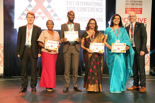 21st International AIDS Conference (AIDS 2016), Durban, South Africa.
Monday 18th July 2016, VENUE : Global Village - Main Stage
Film Event : Every Footstep Counts Awards (MOCA18)
L-R : David Redfern, Prisca Kambole, Andrew Tumuhameho, Poornima Jayakrishna, Priyamvada Singh, and Owen Ryan
Photo©International AIDS Society/Abhi Indrarajan