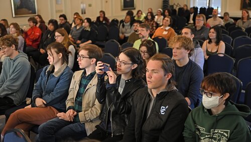 Beth Marsh ’24 records as Kian Miranda-Rodriguez presents his SIP “Sustainability & Awareness: Food Security in Peru” during the Social Justice and Sustainability panel session at the seventh annual All-College Symposium Thursday, November 6, 2025. (Connecticut College photos by Sean D. Elliot)