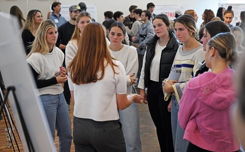 Casey Chesner ’26 “Improving Equity in South Africa’s Healthcare with Cost-Effective Approaches” during the Entrepreneurship pathway poster session at the seventh annual All-College Symposium Thursday, November 6, 2025. (Connecticut College photos by Sean D. Elliot)