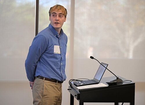 Andrew Harding ’26 presents “Can Understanding and Addressing the Roots of Conflict Produce a Lasting Peace?” during the Peace and Conflict pathway panel session with Emily Brankman ’26 presents “How Do Masculine Perceptions of Leadership Shape the Behavior of Female Politicians?”, Charlotte Head ’26 “What Determines the Success of an International Organization?”, and Anna Taylor ’26 “How Have Political Extremists Weaponized Classical History, and Why Does It Matter?” at the seventh annual All-College Symposium Thursday, November 6, 2025. (Connecticut College photos by Sean D. Elliot)