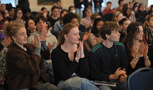 The audience applauds the Creativity pathway panel session with Ava Mary Aloia ’26  “An Actor's Training and the Empowering of a Human Being”, Ainsley Cornwall ’26 “Exploring Modern Misconceptions of History & Translating Them to Today”, Aoife Butler ’26 “Everyone Joins a Band: Collaborative Art in a Disconnected World”, and Kate Jeffrey ’26 “Artists Don't Need to Starve” at the seventh annual All-College Symposium Thursday, November 6, 2025. (Connecticut College photos by Sean D. Elliot)