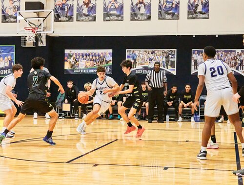 Varsity Boys Basketball 
Home Game
Gym