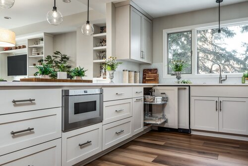 cabinet color: Accessible Beige by Sherwin williams, corner base cabinet storage, base drawers