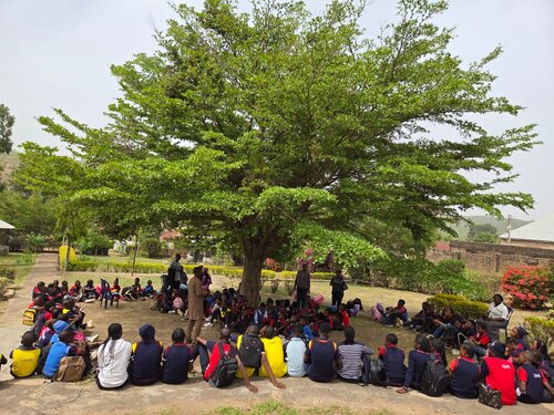REPORT ON EARTH DAY ACTIVITIES AT CITY OF MERCY CHRISTIAN ACADEMY 
In line with the theme for this year’s Earth day  “Our Power, Our Planet” , Our school City of Mercy Christian Academy one of the Centre of Excellence  for Climate Smart Agriculture Youth Network Global (GCSAYN) Nigeria organised an event which featured an engaging workshop and establishing a herbal garden with the theme "Medicines from the Earth"

The event had 152  participants 
 of which  132 were elementary and high schoolers while the remaining 20 participants were teachers.

This was to educate the pupils and students of City of Mercy Christian Academy on the importance of caring for our Environment since they are young and easier to model good behavior in them.Also they can be encouraged to choose to be  actors or left to be Victims of a destroyed Earth.

The Theme " our power our planet "says it all in the sense that we lose our power when we lose our planet. We live and depend on the earth for ALL of  our resources such as water, food, earth, housing etc.
Mr Thomas Mafeng and his team was invited from the city’s agency responsible for environmental planning and development (Jos Metropolitan Development Board, JMDB) and Mr Satkat Longchi From the Department of Plant Science and biotechnology,  University of Jos. 
The session focused on issues affecting the earth  such as waste management, recycling, planting of trees to boost the supply of oxygen and disease prevention and control. These concepts were communicated such that both elementary graders and high schoolers could relate to them and put the recommended measures into practice. 
In line with theme of the earth day; Our Power, Our Planet, the first session was anchored by the Proprietor, City of Mercy Christian Academy, Veronica Edeki who introduced the theme to the students, highlighting the need for everyone to be conscious of the earth as a living entity.
Mr Thomas from the JMDB team brought further insight on how the earth supports humanity and so deserves to be cared for. The students were also educated on proper ways to dispose waste, prevent flooding, rodents and pest control and how to manage other environmental hazards.
The students then proceeded to plant various trees and herbs at the school garden as a way of putting into practice what they had learnt about caring for the earth by planting trees to increase the supply of oxygen in their environment. Plants such as Moringa, Aloe Vera, Lemon Grass, Sweet basil, and scent leaf were planted at the school garden by the students
Some of the insightful quotes by our learners can be found in the videos sent alongside the pictures sent to the link included.

Students gained insights in the following areas,Waste Management .Waste disposal 
Recycling,Rodents and pest prevention and control ,Disease prevention and control, Environmental hazards and earth hygiene
As well as practical Knowledge on how to plant trees and herbs stressing food and medicinal plants as benefits we detive from the Earth.

Earth day activities at City of Mercy Christian Academy was highly impactful as the students came up with some resolutions which focuses on behavioral changes that will help protect the earth. This can be found in videos sent alongside the pictures that accompany this report.
Thank you for creating awareness and an opportunity for us to join in this years Earth Day. The impact is surely going to be long lasting.