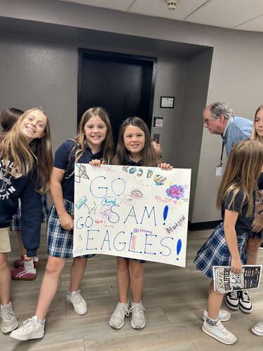 Elementary kids cheer for track & field going to state