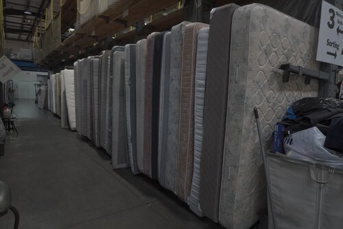 Mattress Warrior Day! In just 3 hours 2 groups of volunteers deconstructed over 90 mattresses so they can be properly recycled and kept out of the landfill!