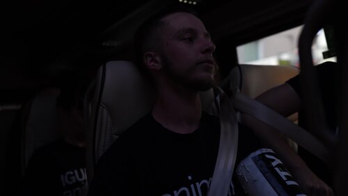 Activist focused on the van on the way to the action