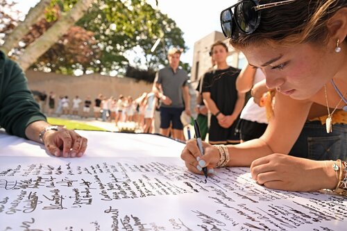 Members of the Class of 2030 sign the Honor Code and ring the Castle Court gong to mark their formal matriculation Monday, August 31, 2026 at Evans Hall and Castle Court. (Connecticut College photos by Sean D. Elliot)